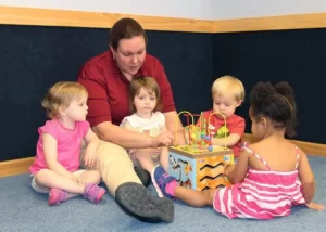 Skipwith Academy Rutland teacher doing activity with young children