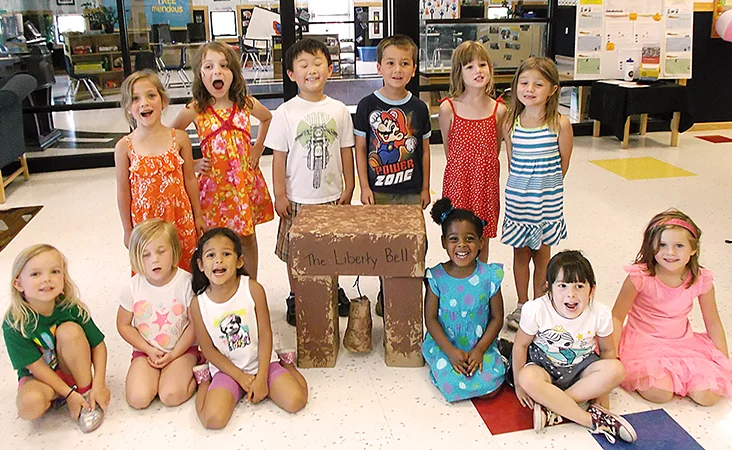 Skipwith Academy mission - image of Woodlake kids with Liberty Bell project