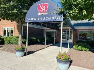 Skipwith Academy at Hanover - childcare in Ashland, Virginia, near Richmond - front entrance awning with logo